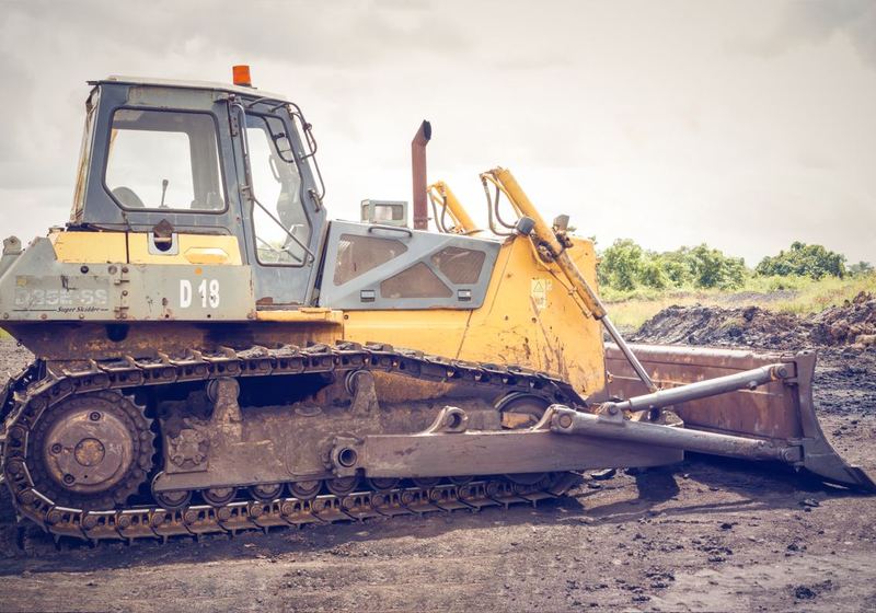 Dozer clearing a demolition site